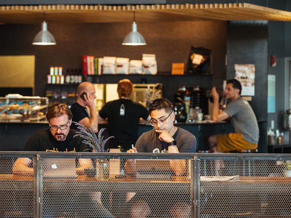 People work on their computers at Rumsy's Cafe at The Front in Salt Lake City