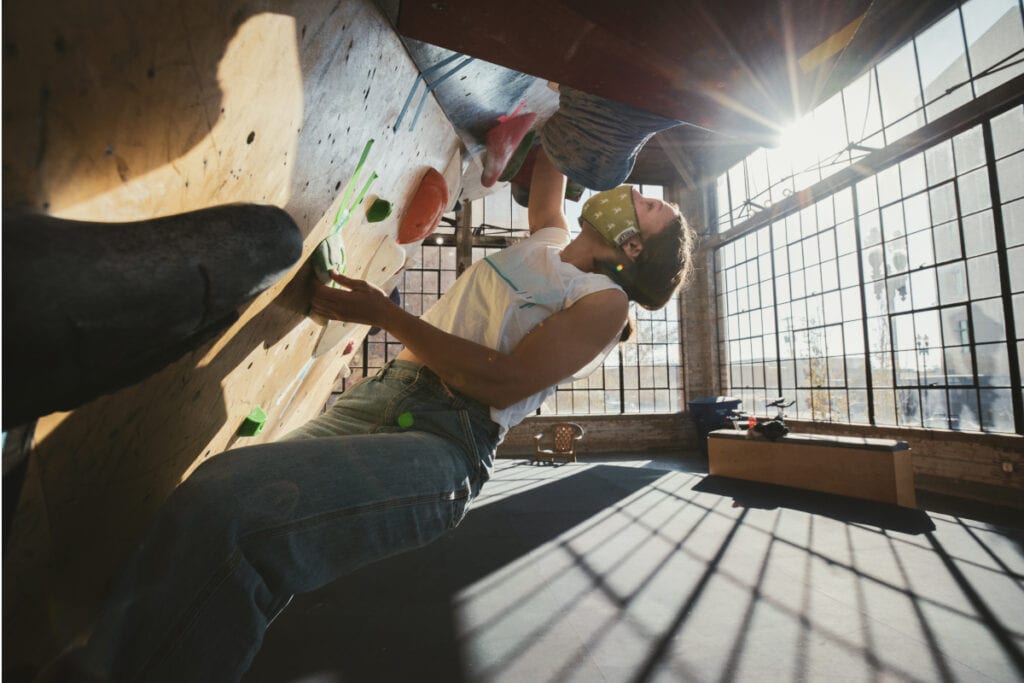 A rock climber training at an indoor gym in Ogden, Utah